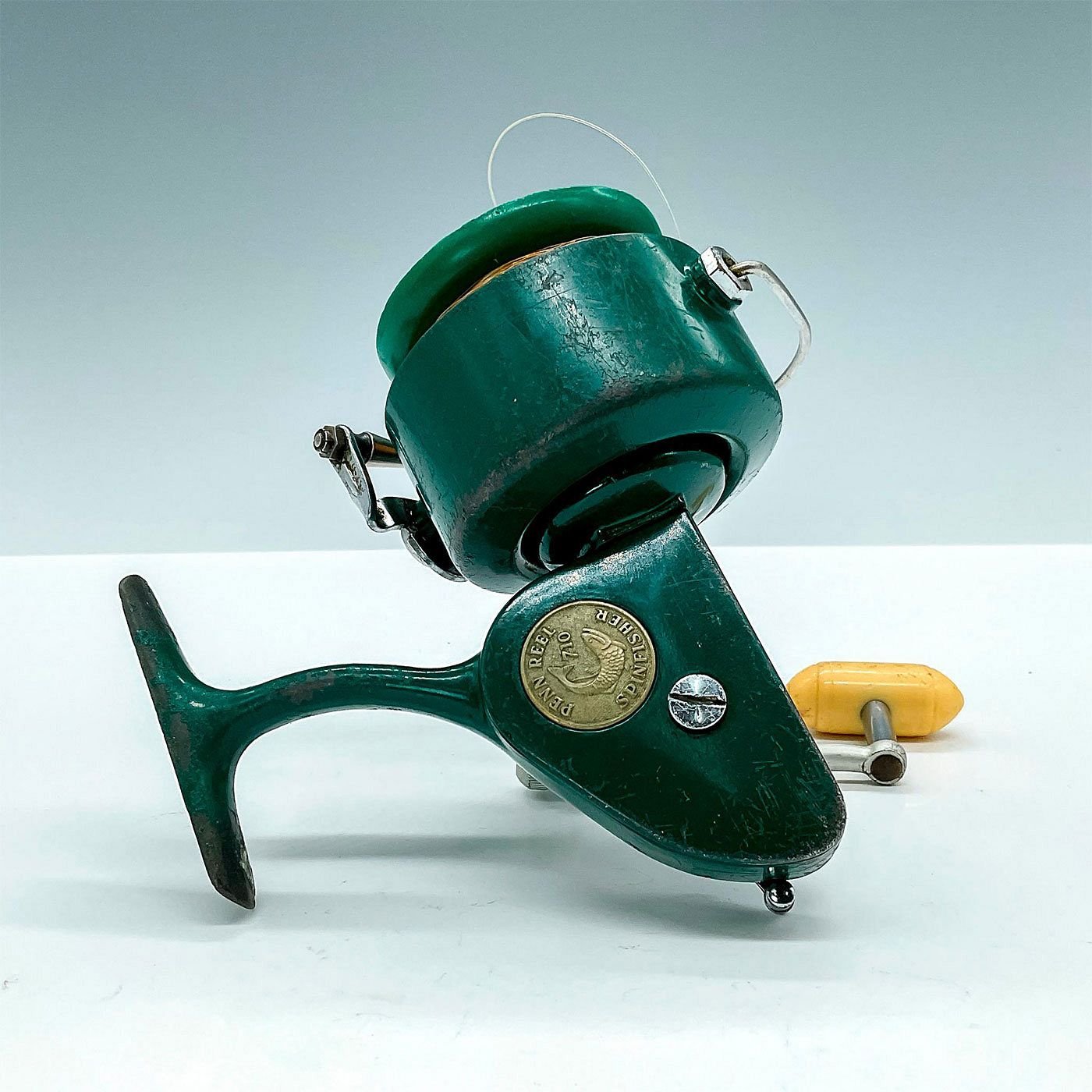 Vintage Penn 710 Greenie Spinfisher Spinning Reel sold at auction